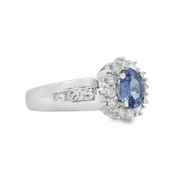 Whtie Gold Tanzanite and Diamond Halo Ring