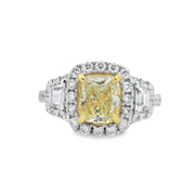 White and Yellow Gold Fancy Yellow Diamond Three-Stone Halo Ring