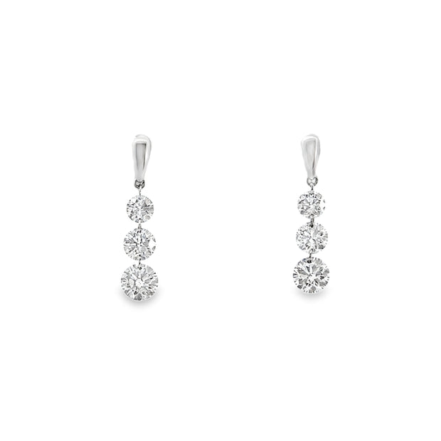 White Gold Graduated Three Stone Diamond Dangle Earrings