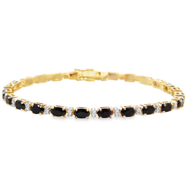 Yellow Gold Black Onyx and Diamond Fashion Bracelet