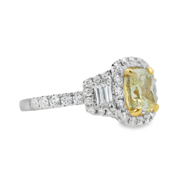 White and Yellow Gold Fancy Yellow Diamond Three-Stone Halo Ring